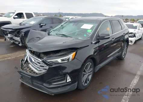 2020 Ford Edge Titanium z USA, uszkodzony, nr VIN 2FMPK4K98LBA14044